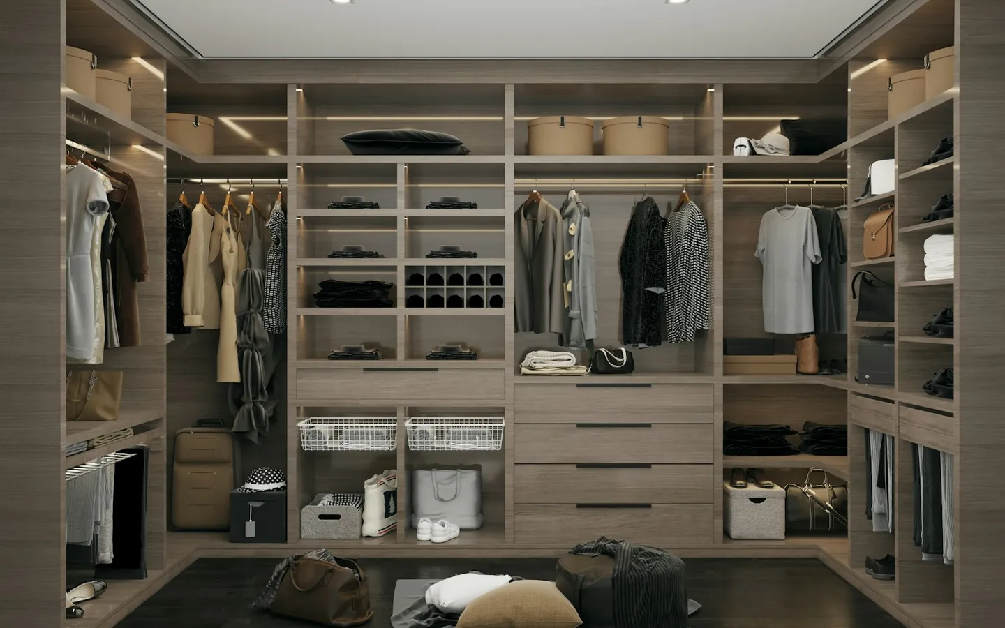 Walk-in closet with neat shelves, drawers and hanging clothes